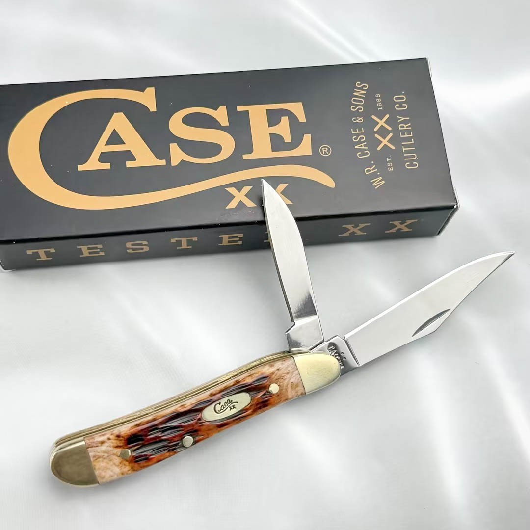 Case xx Knives 00045 Peach Seed Jig Amber Bone Peanut Stainless Pocket Knife