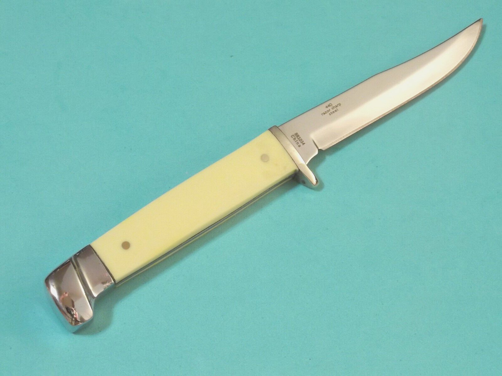 ROUGH RYDER RR1034 Small Hunter Yellow synthetic full tang knife 6 1/4″ overall