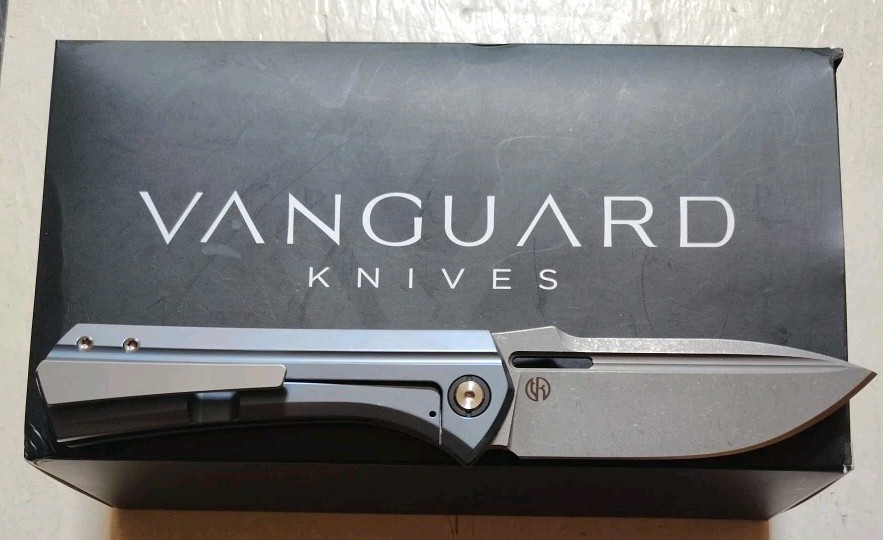 New Vanguard Continuum Framelock 3.4″ M390 SW Drop Point Blue Ti & CF Handle