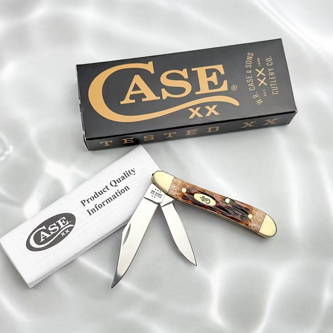 Case xx Knives 00045 Peach Seed Jig Amber Bone Peanut Stainless Pocket Knife