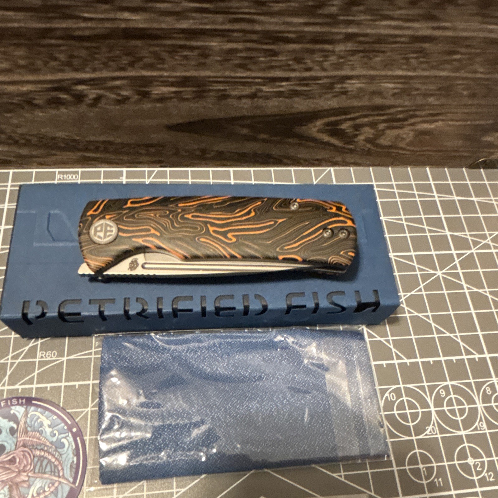 Petrified Fish Beluga Black/Orange G10 14C28N Drop Point