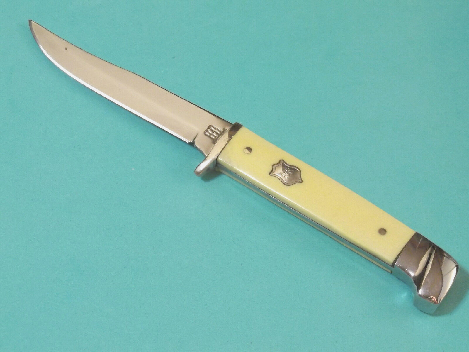 ROUGH RYDER RR1034 Small Hunter Yellow synthetic full tang knife 6 1/4″ overall