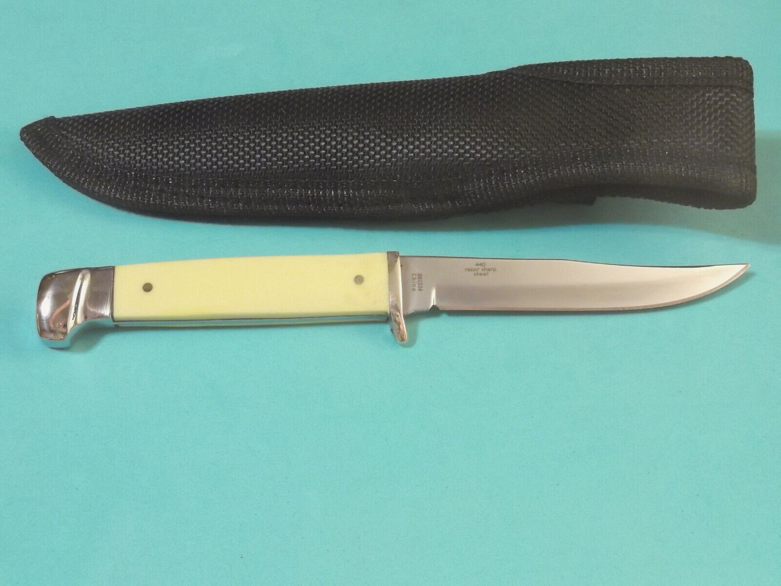 ROUGH RYDER RR1034 Small Hunter Yellow synthetic full tang knife 6 1/4″ overall