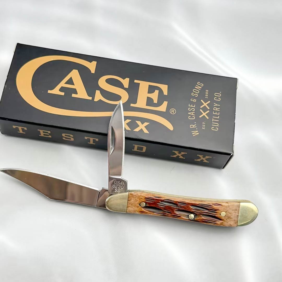 Case xx Knives 00045 Peach Seed Jig Amber Bone Peanut Stainless Pocket Knife