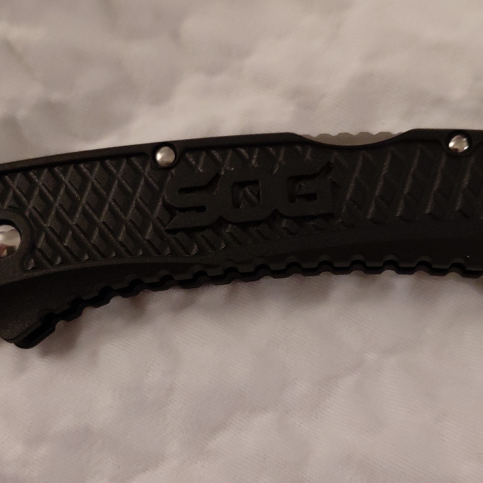 SOG Pocketknife Folding 2.76-4in Tanto Plain Edge Liner Lock Black Clip