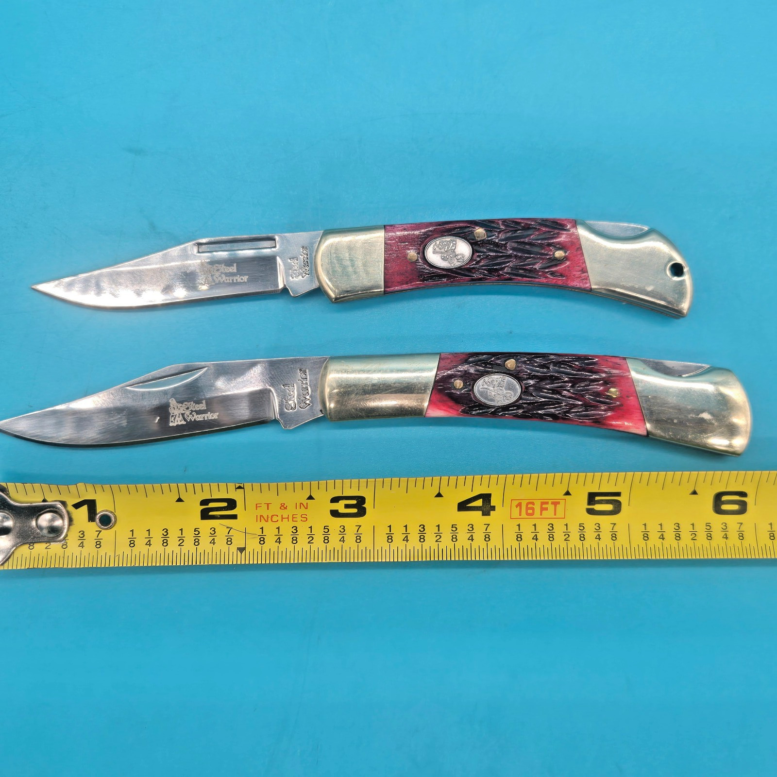 2 (TWO) STEEL WARRIOR BONE HANDLE LOCKBACK POCKET KNIVES. 3.5 «& 3» HANDLES.