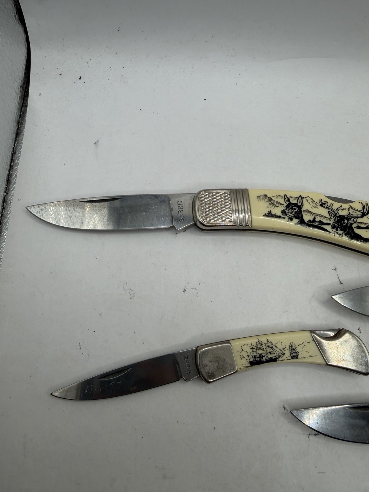 Sabre SCRIMSHAW Folding Knife «Outdoor Collection» Stainless China Lot of 4