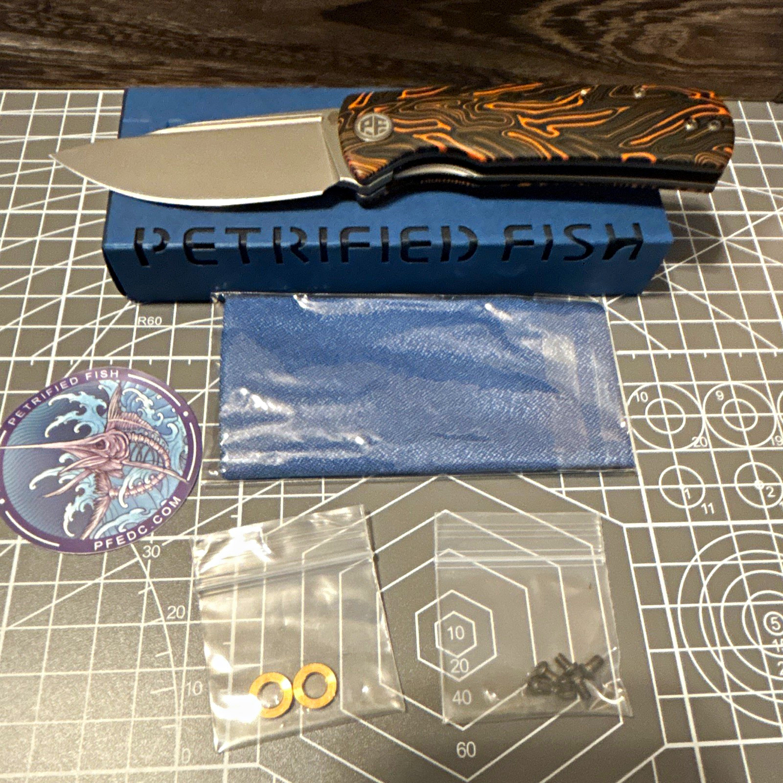 Petrified Fish Beluga Black/Orange G10 14C28N Drop Point