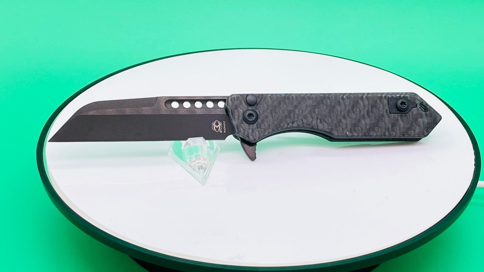 Heretic Jinn – Glow Carbon Fiber Handle, Manual, Wharncliffe Black DLC Blade