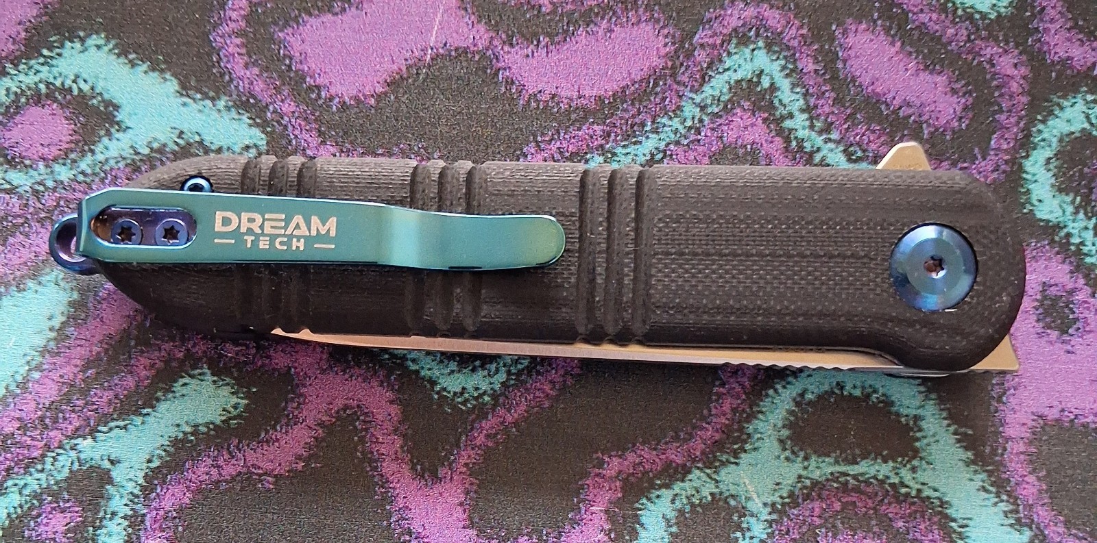 Dreamtech K4324GB Pivot Button Lock Black G10 Blue Accents 14C28N Pocket Knife
