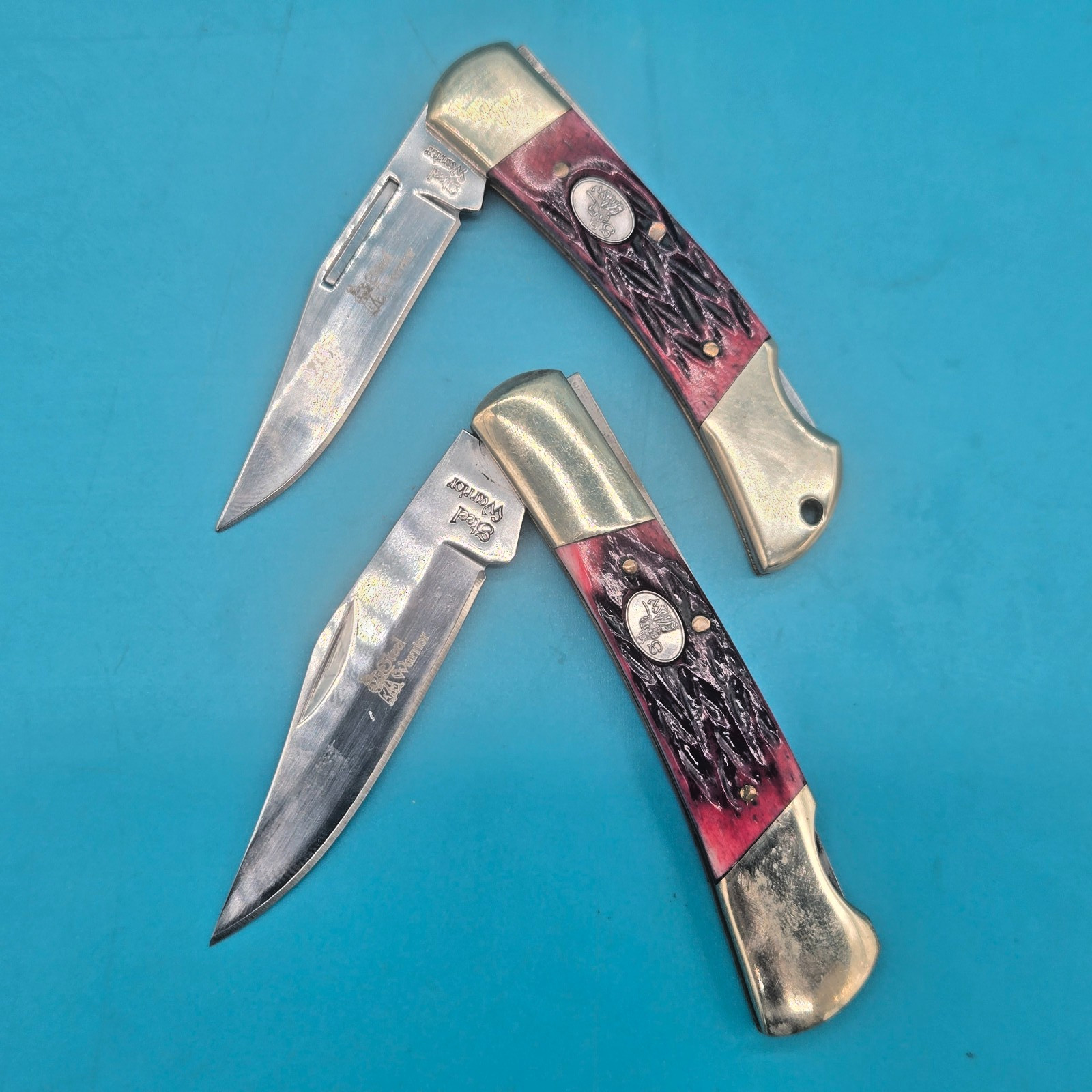 2 (TWO) STEEL WARRIOR BONE HANDLE LOCKBACK POCKET KNIVES. 3.5 «& 3» HANDLES.