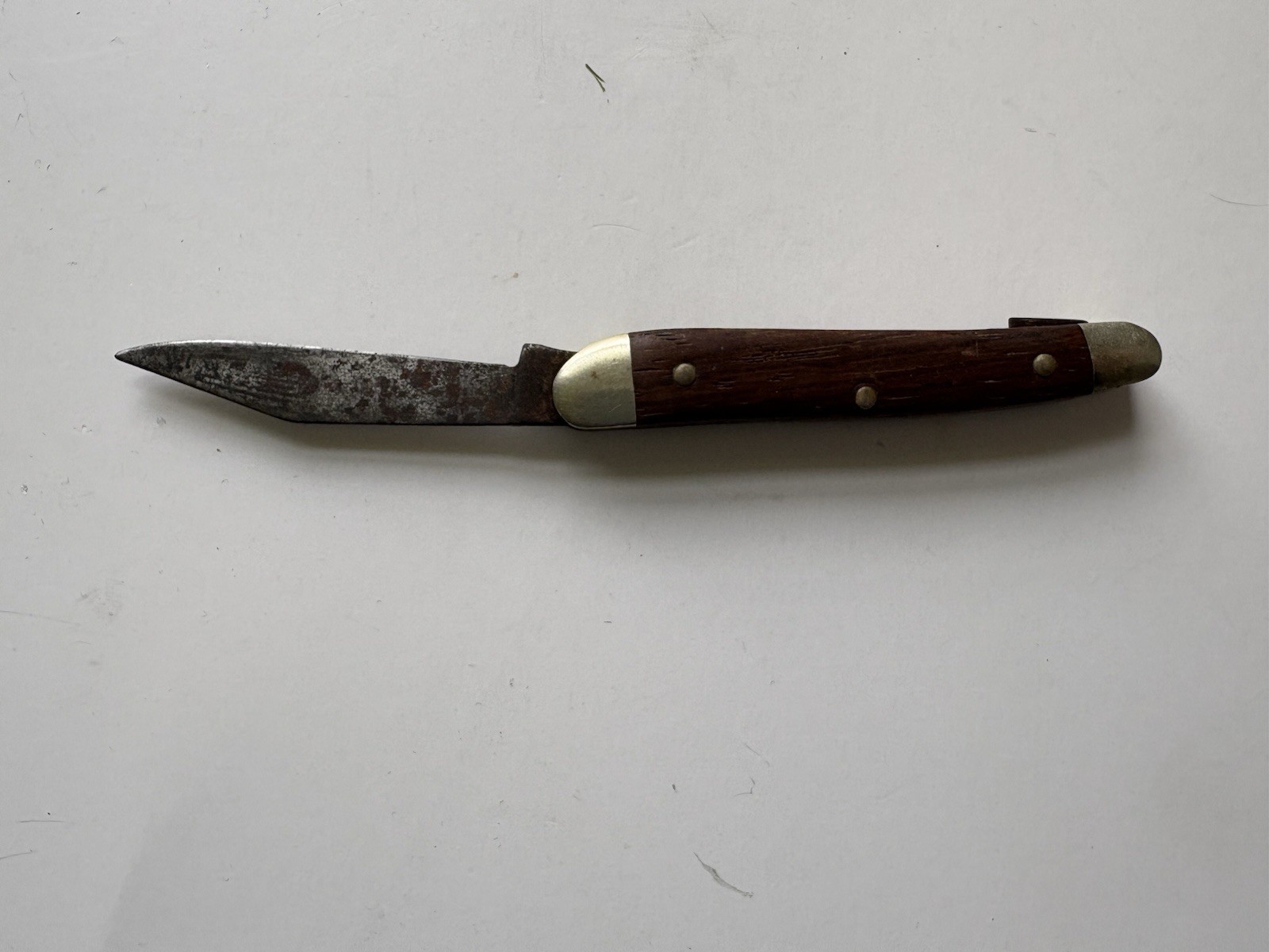 Vintage Single Blade Pocket Knife With Wooden Handle And Brass Bolsters