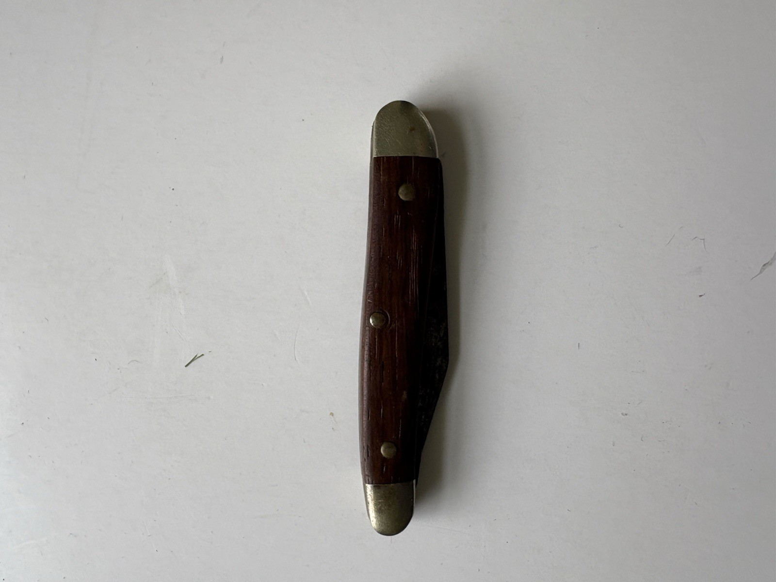 Vintage Single Blade Pocket Knife With Wooden Handle And Brass Bolsters