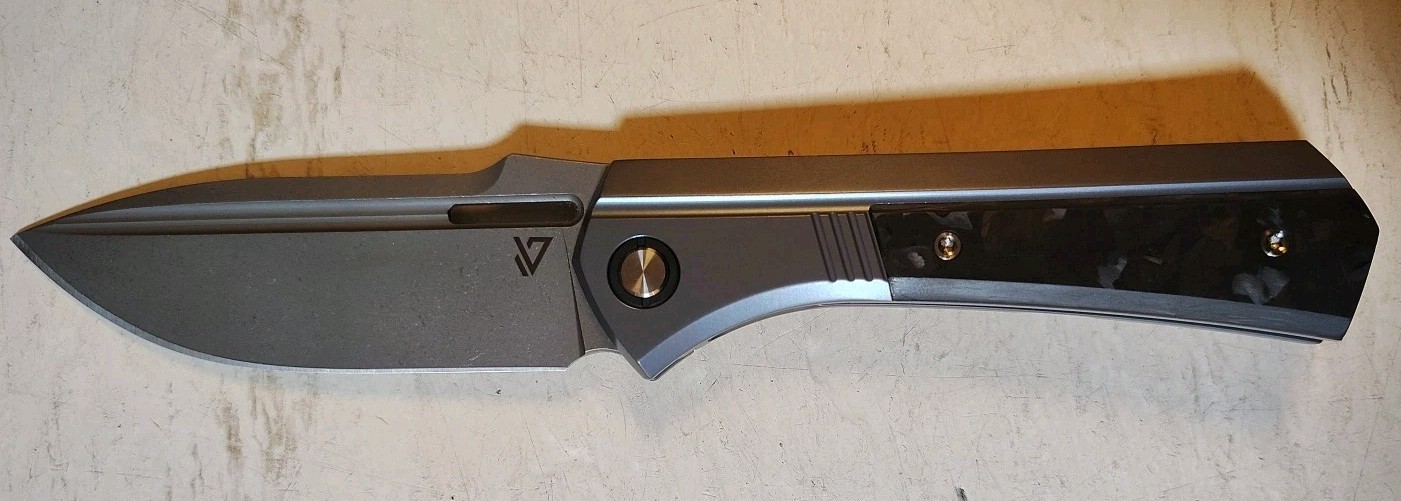 New Vanguard Continuum Framelock 3.4″ M390 SW Drop Point Blue Ti & CF Handle