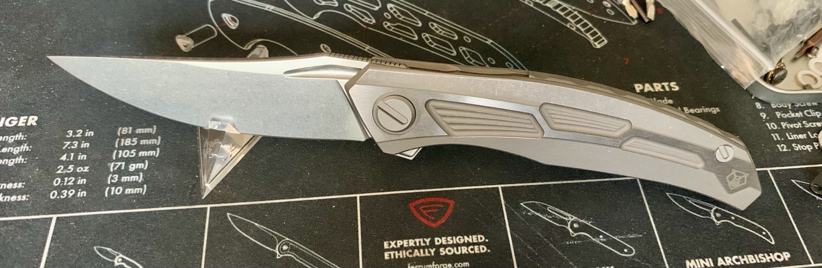 Titanium Framelock Flipper w/ Trailing Point Satin Finish M390 Blade