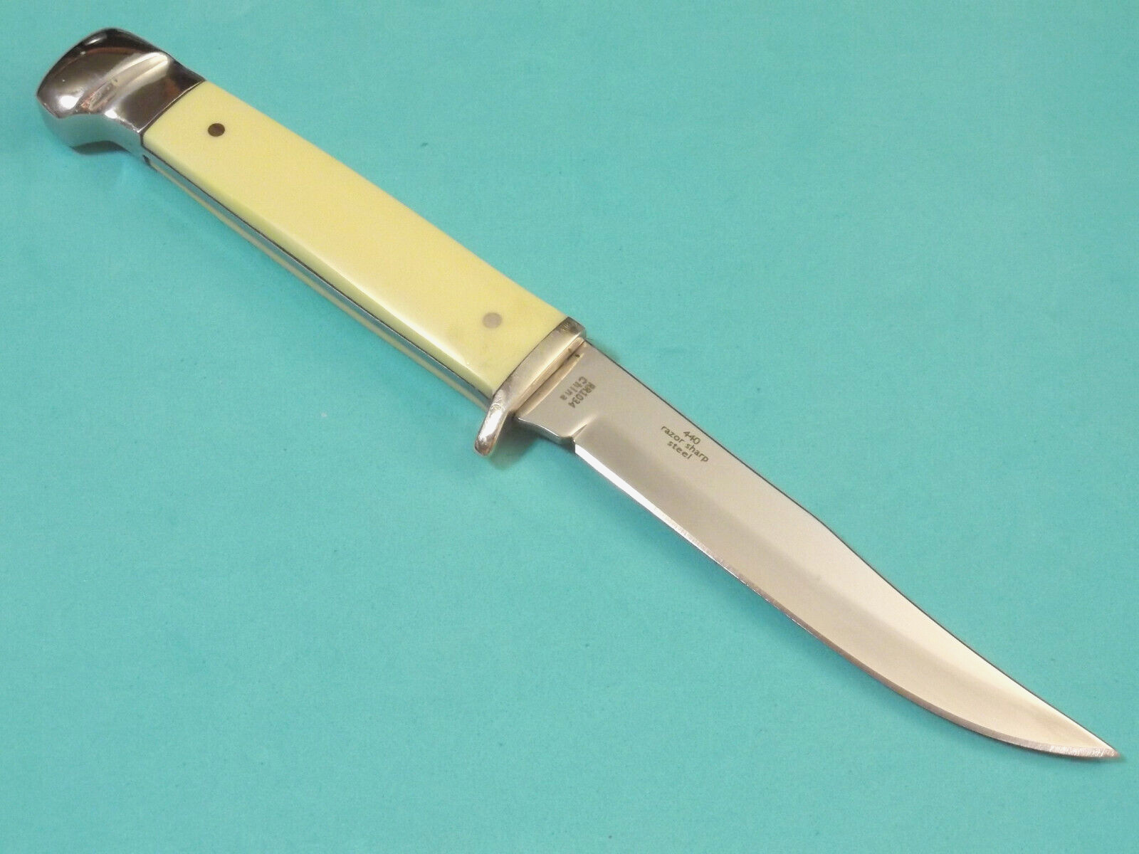 ROUGH RYDER RR1034 Small Hunter Yellow synthetic full tang knife 6 1/4″ overall