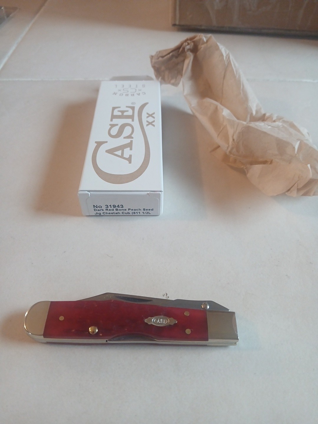 Case XX 2026 Dark Red Bone Peach Seed Jigged Cheetah Cub 611 1/2L CS ITEM #31943