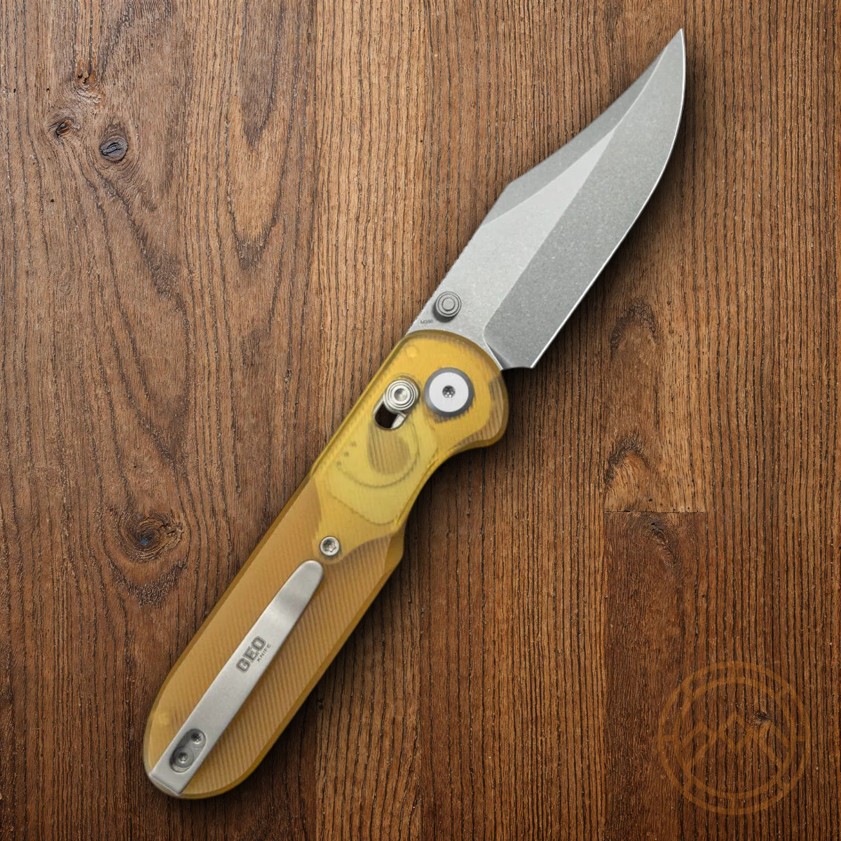 GEO Knife Ethereal Folding Knife 3″ Bohler M390 Steel Blade Amber Ultem Handle