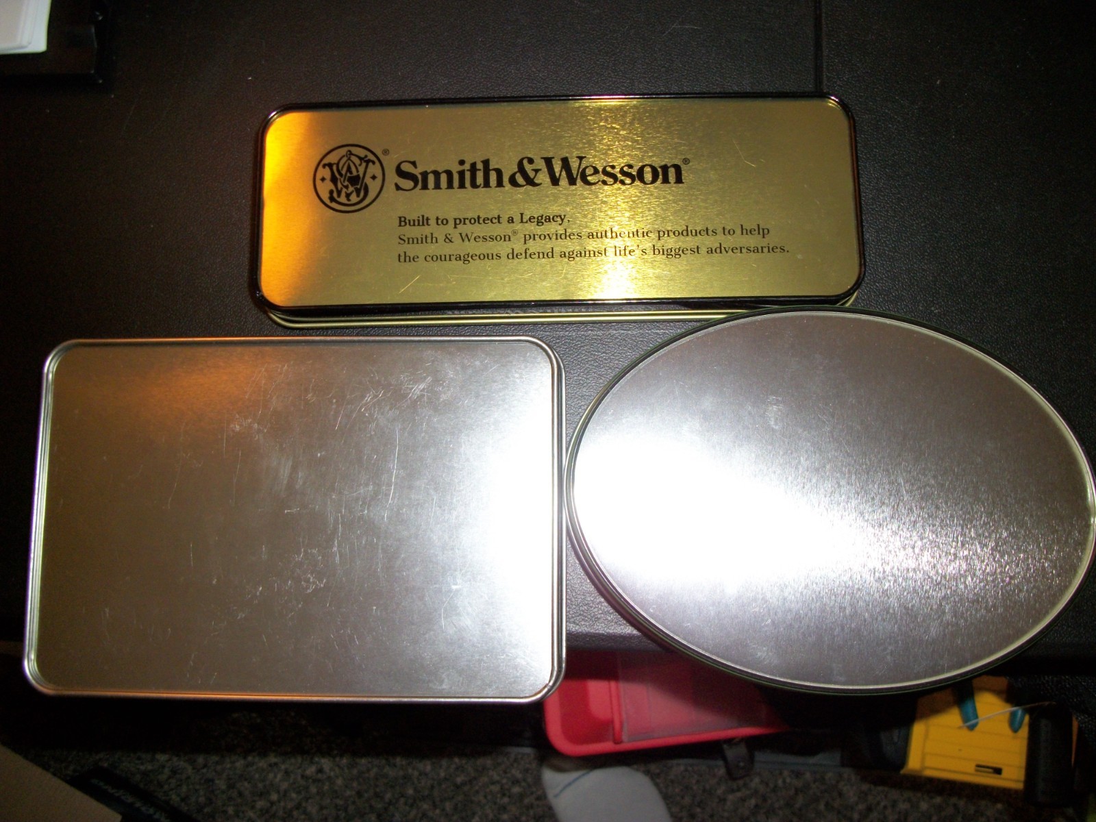 3 KNIFE TINS WINCHESTER, REMINGTIN, & SMITH&WESSON NONE HAVE KNIVES NICE SHAPE