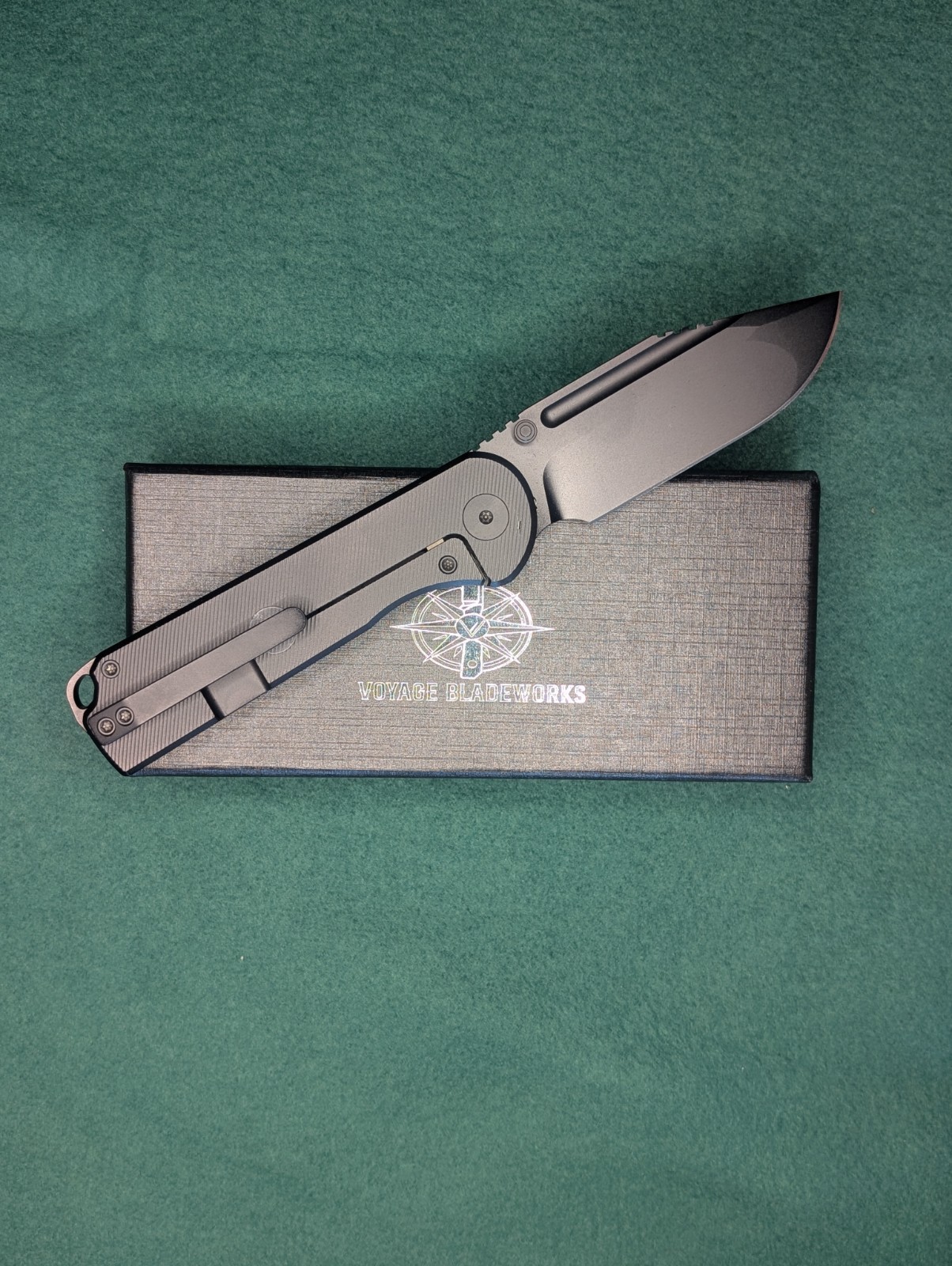 Voyage Bladeworks Avius Drop Point Plain Edge Manual Frame Lock Gray Ti Clip