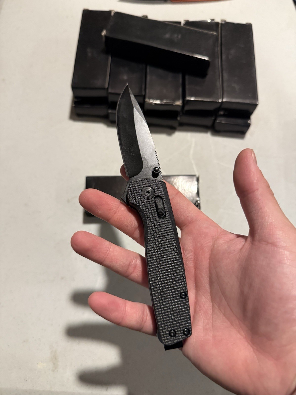 Black Folding Pocketknife Drop Point Blade Textured Handle Manual Opening
