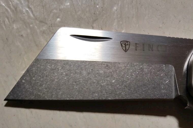Finch Knife Co RUNTLY XL Dark Side Flipper 3.15″ M390 Wharnie Ti w/CF Handle