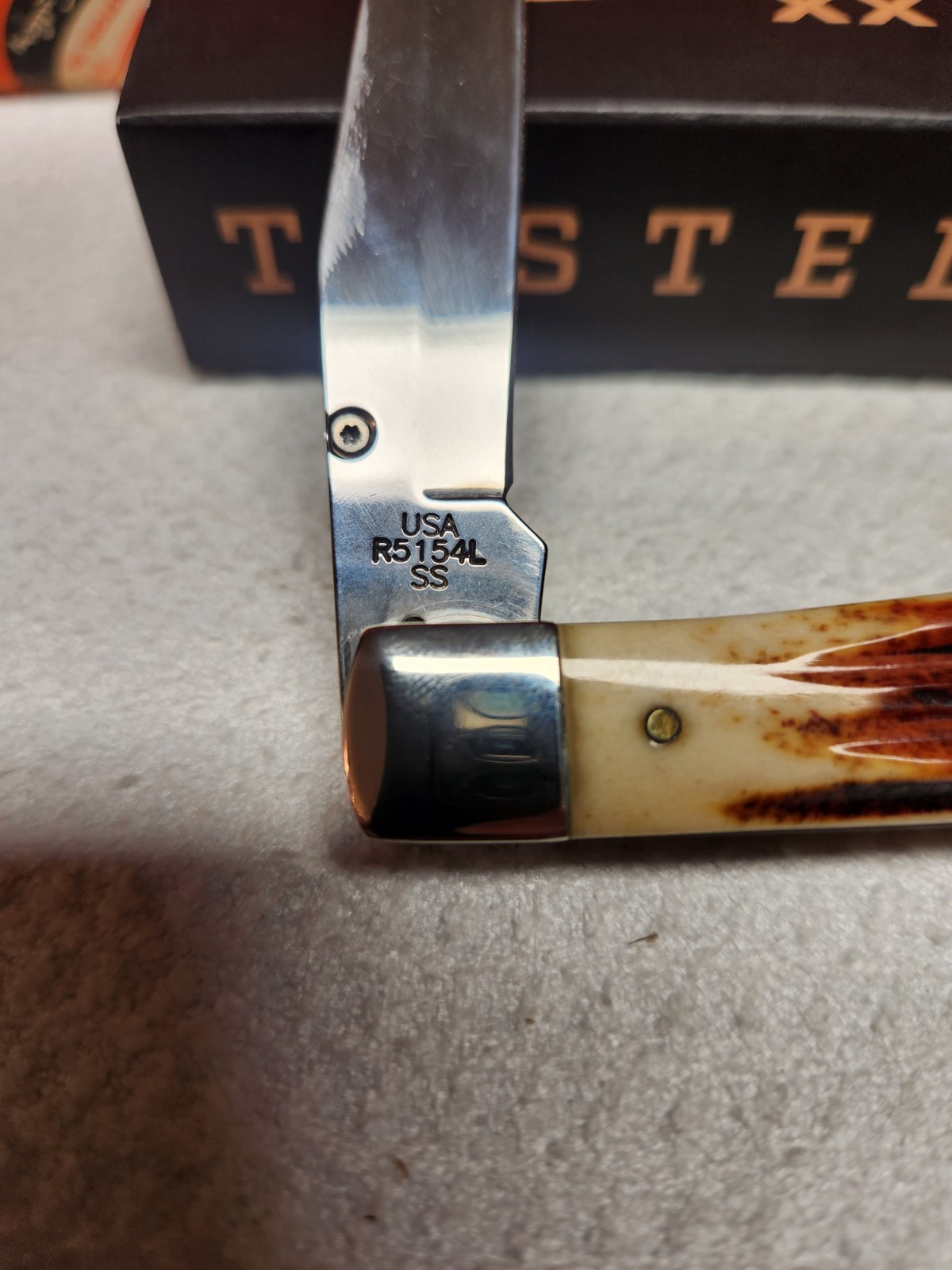 2010 Case Xx Trapperlock Genuine Red Stag Second Cut Handles.