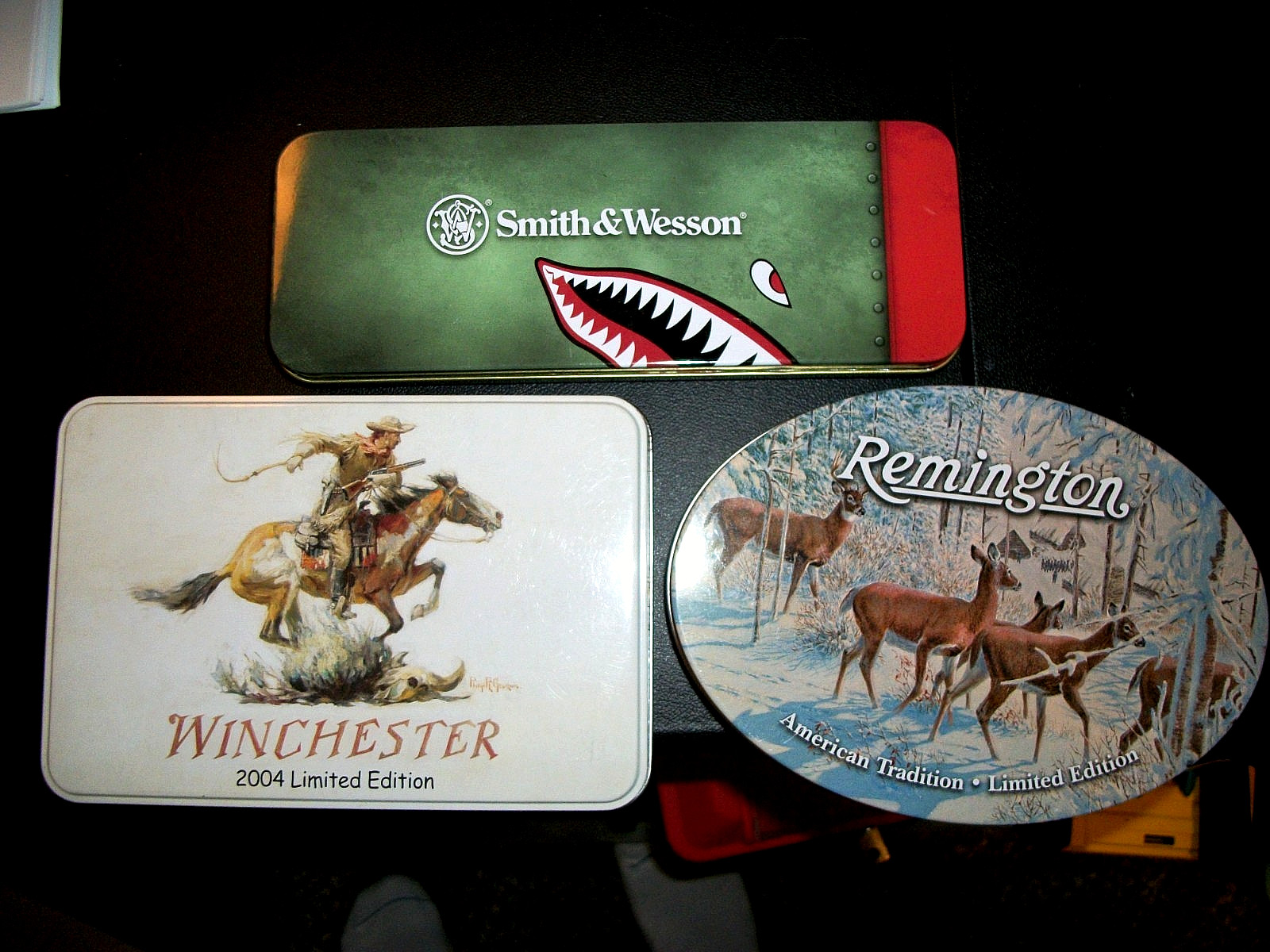 3 KNIFE TINS WINCHESTER, REMINGTIN, & SMITH&WESSON NONE HAVE KNIVES NICE SHAPE