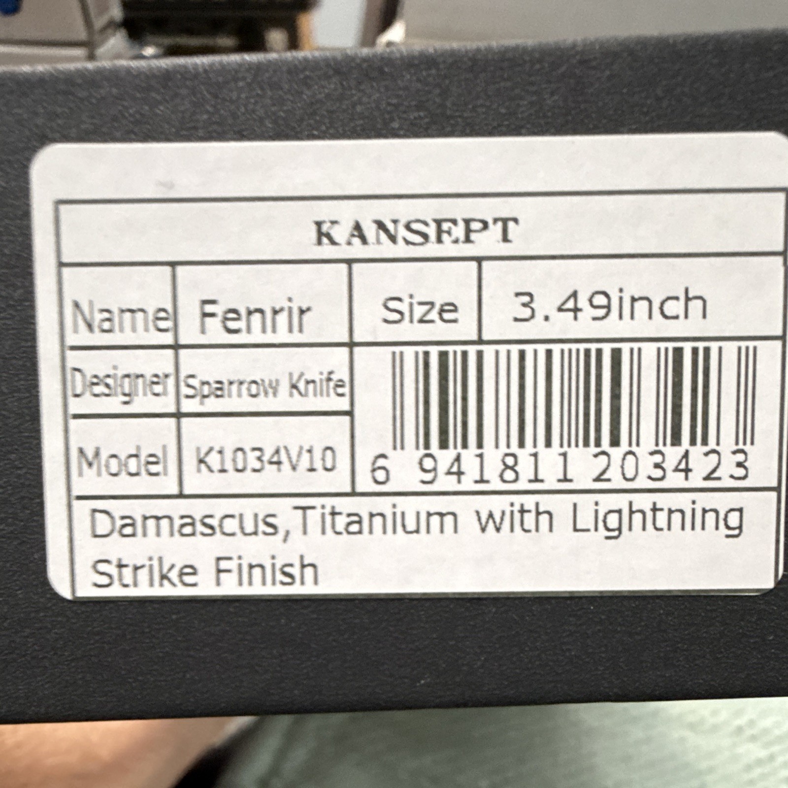 Kansept Fenrir | Damascus Steel Manual Drop Point Plain | Button Lock Ti Blue
