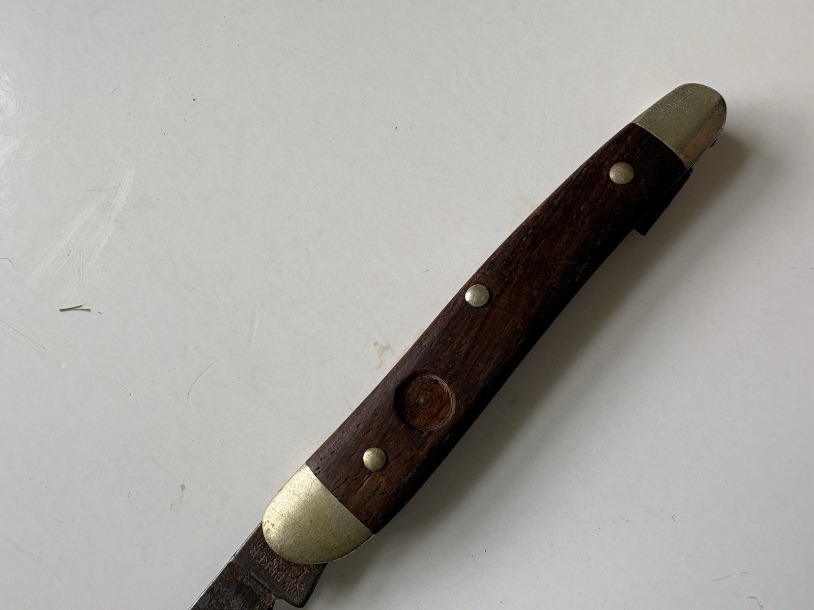 Vintage Single Blade Pocket Knife With Wooden Handle And Brass Bolsters