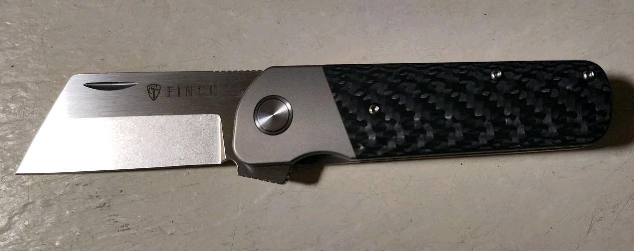 Finch Knife Co RUNTLY XL Dark Side Flipper 3.15″ M390 Wharnie Ti w/CF Handle