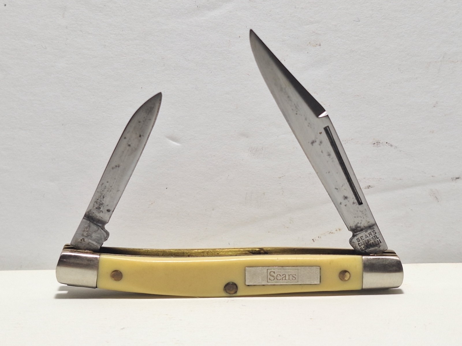 VINTAGE SEARS BRANDED SMALL PEANUT KNIFE CARBON STEEL #95301 YELLOWISH/WHITE