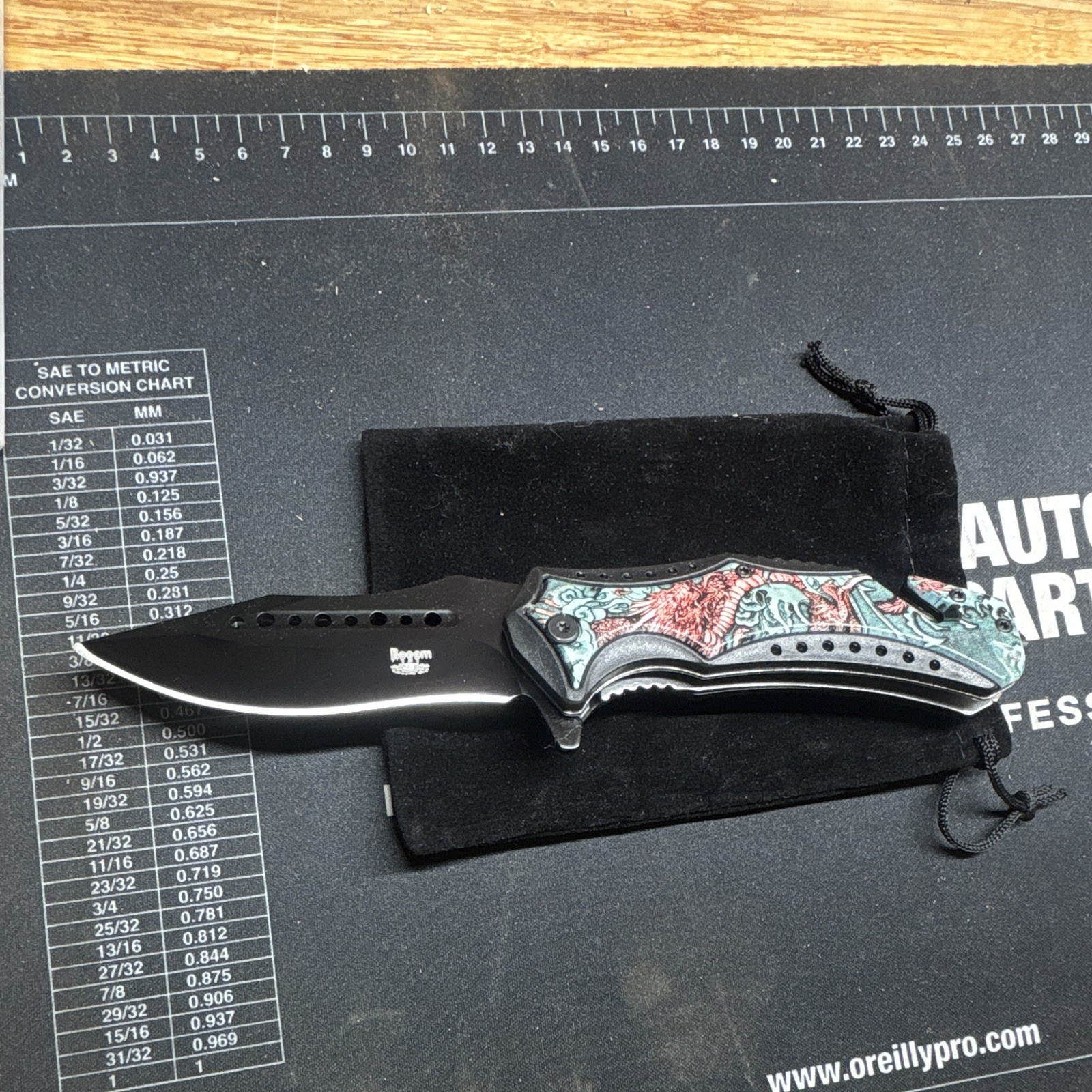 Böker Magnum Pocketknife Drop Point Plain Edge 2.76-4in SS Liner Lock Blue/Red