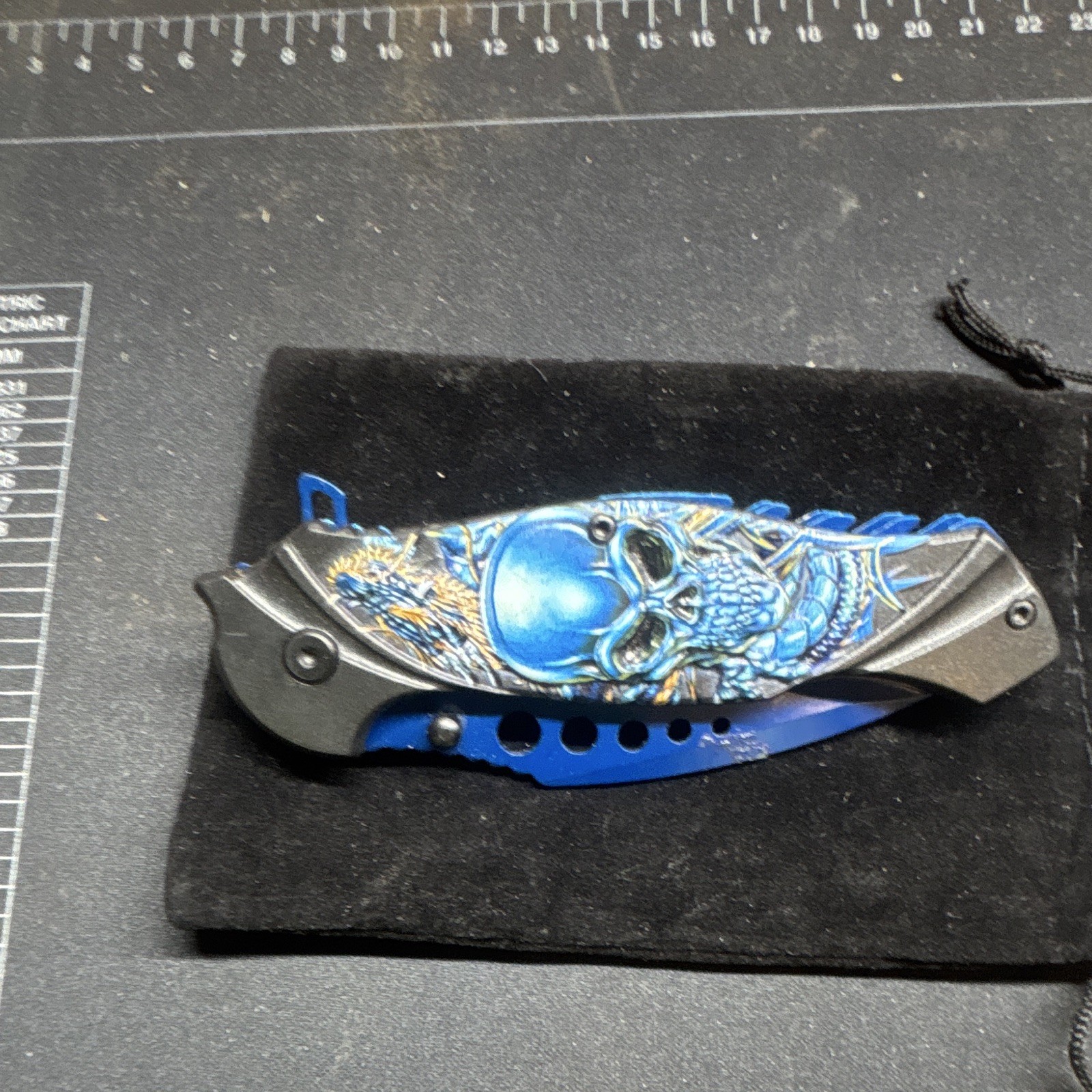 Skull Folding Pocketknife Manual Drop Point Plain Edge 2.76-4in SS Liner Lock