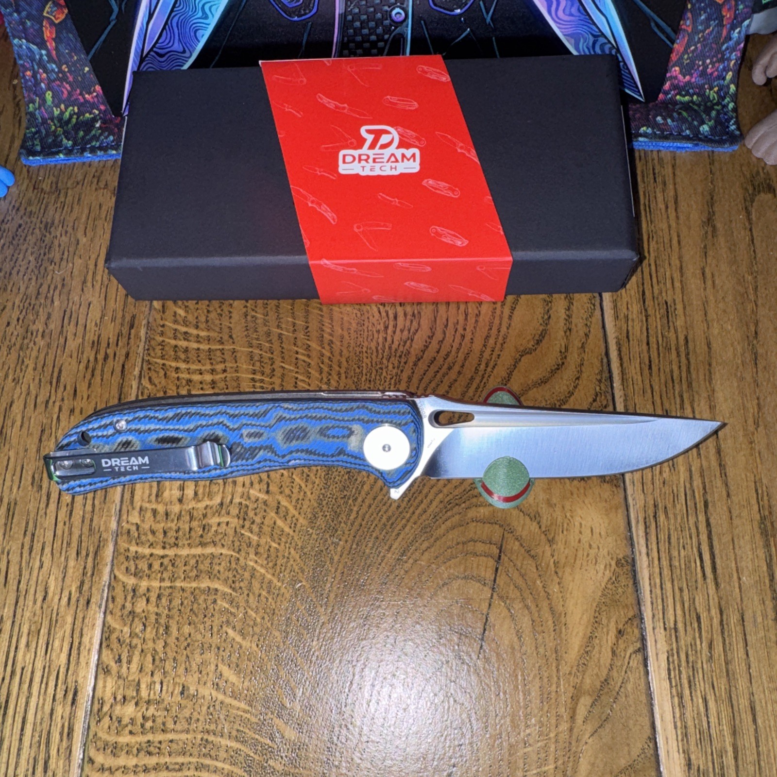 Dream tech D3898MBL Back Flip. Liner Lock. D2 Steel. Blue Multi Colored Micarta