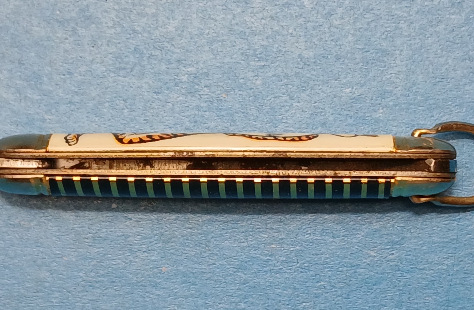 Imperial Providence RI USA. Single Blade with bail. Tiger graphic. 1954-1988.