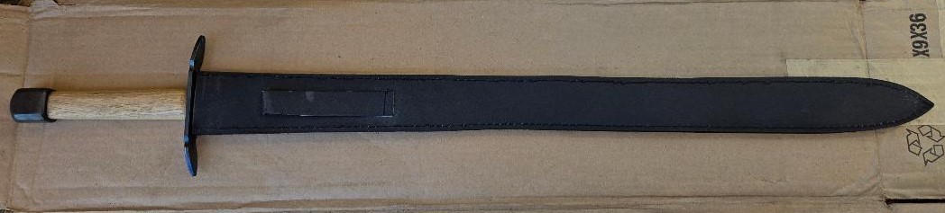 Hand and a half medieval sword, very sturdily built, dull edges, black sheath