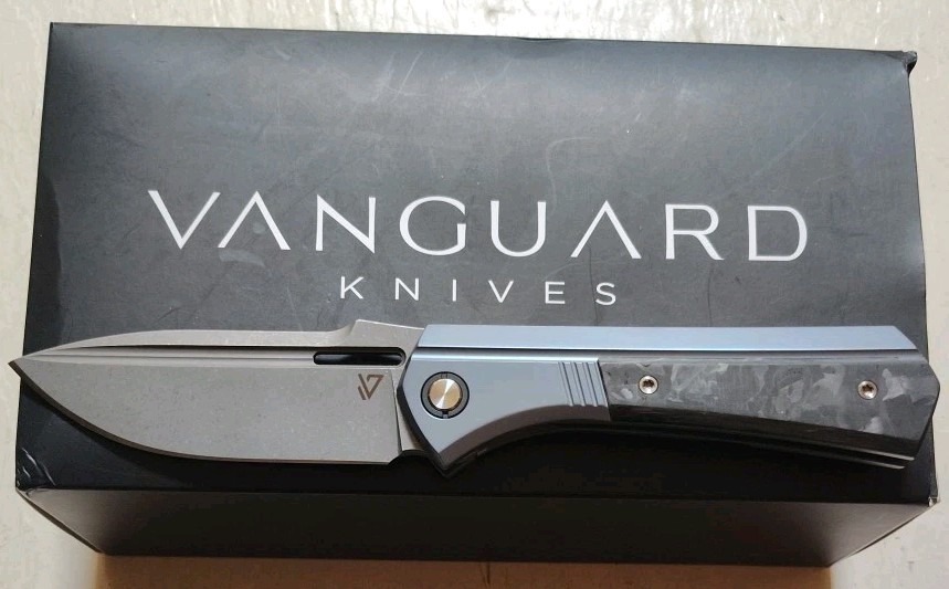 New Vanguard Continuum Framelock 3.4″ M390 SW Drop Point Blue Ti & CF Handle