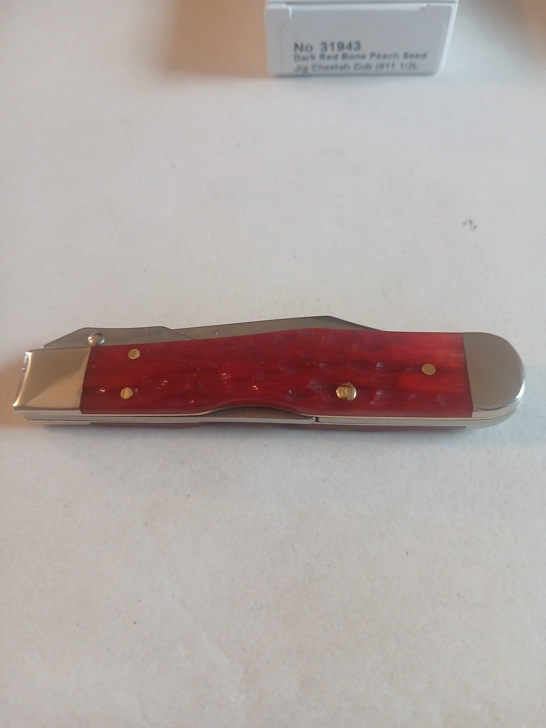 Case XX 2026 Dark Red Bone Peach Seed Jigged Cheetah Cub 611 1/2L CS ITEM #31943