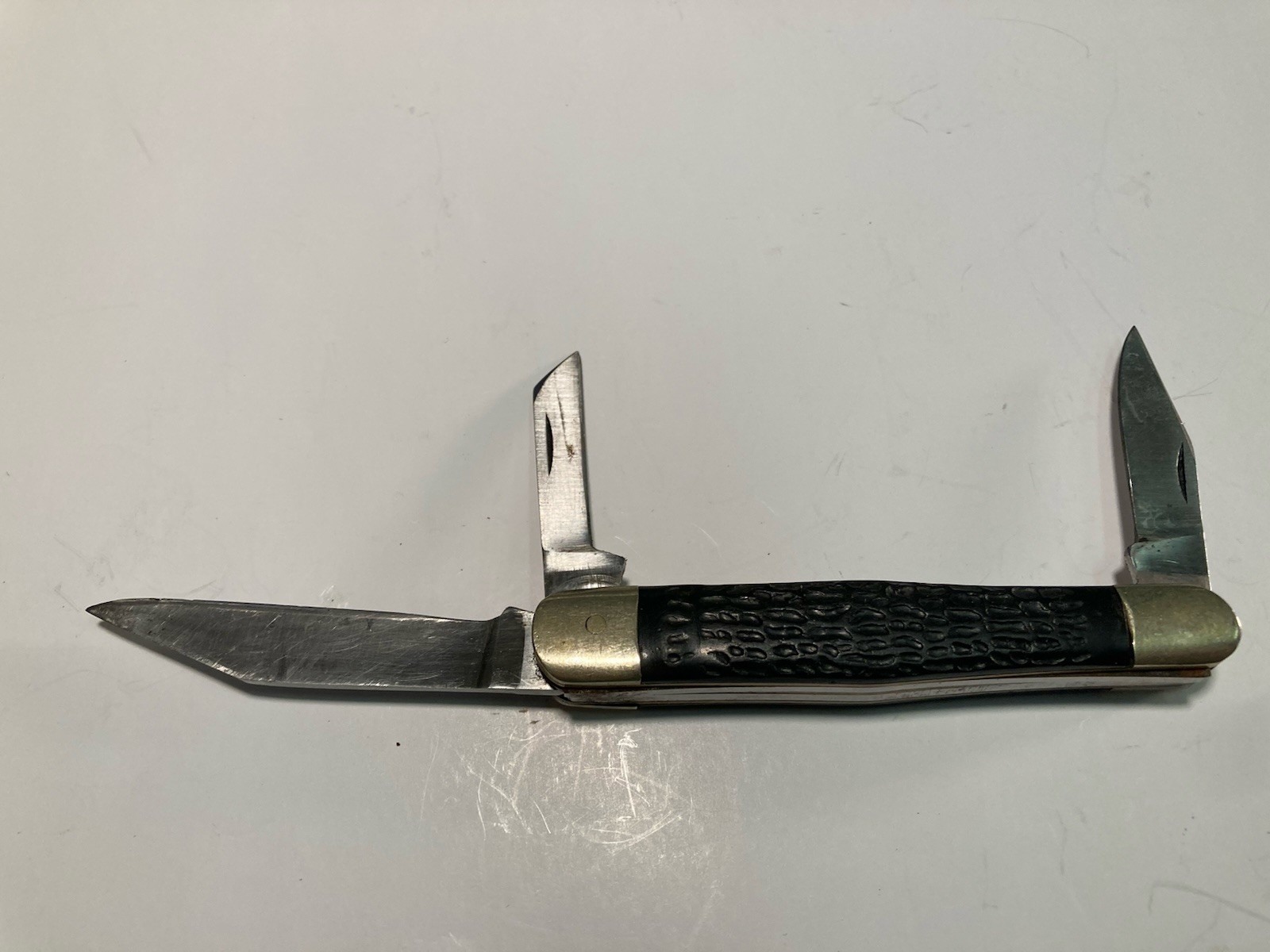 Vintage Three Blade Pocket Knife With Black Wood Grain Plastic Handle