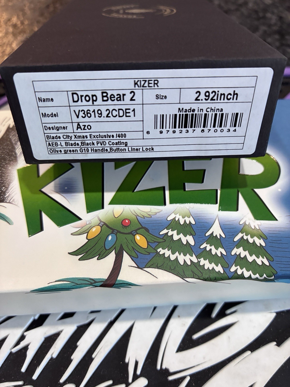 Kizer Drop Bear 2 – Blade City Xmas Exclusive /400 – AEB-L, G10, Button Lock