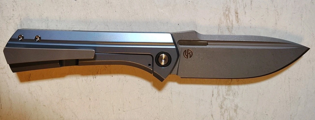 New Vanguard Continuum Framelock 3.4″ M390 SW Drop Point Blue Ti & CF Handle