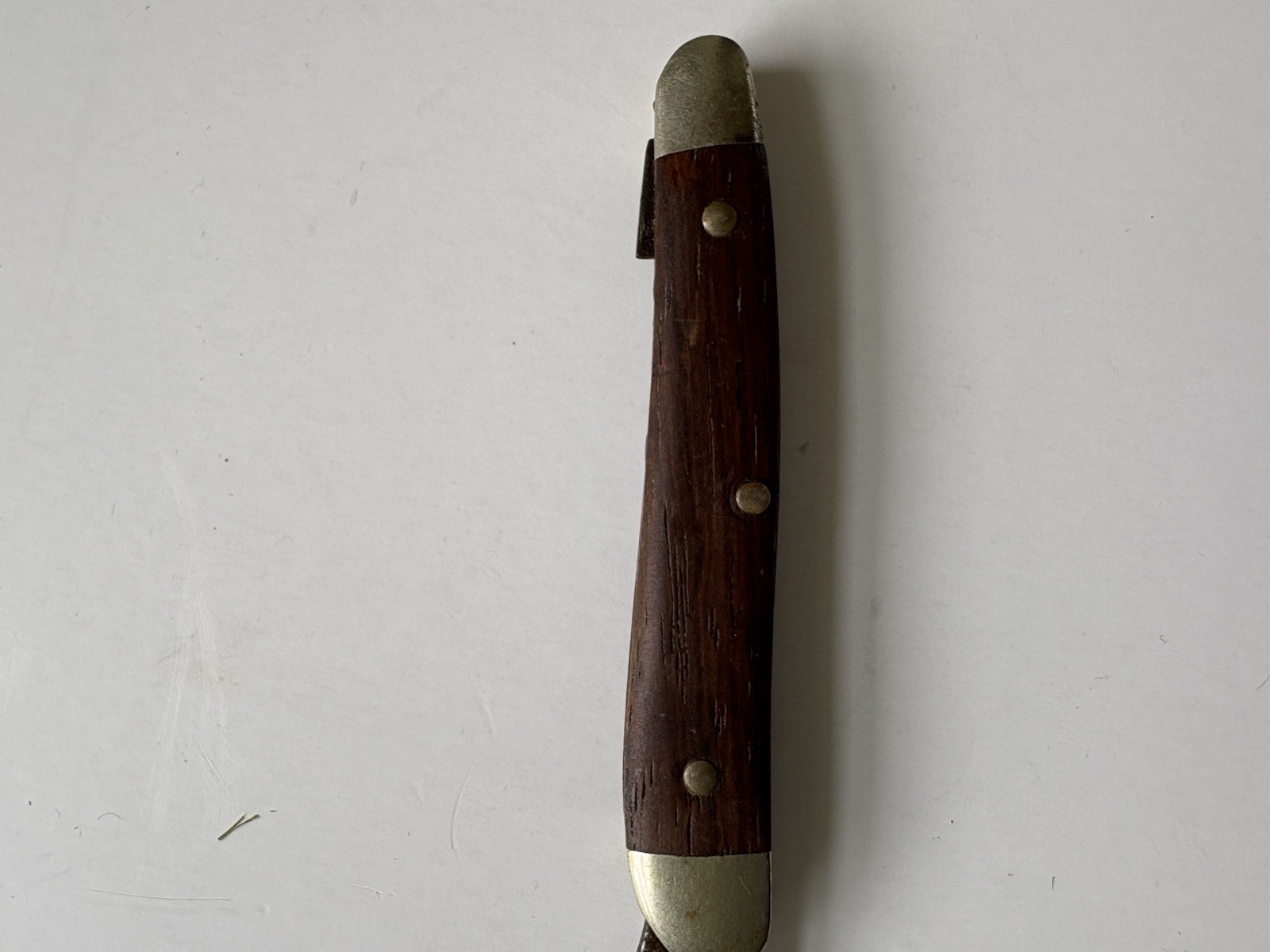 Vintage Single Blade Pocket Knife With Wooden Handle And Brass Bolsters