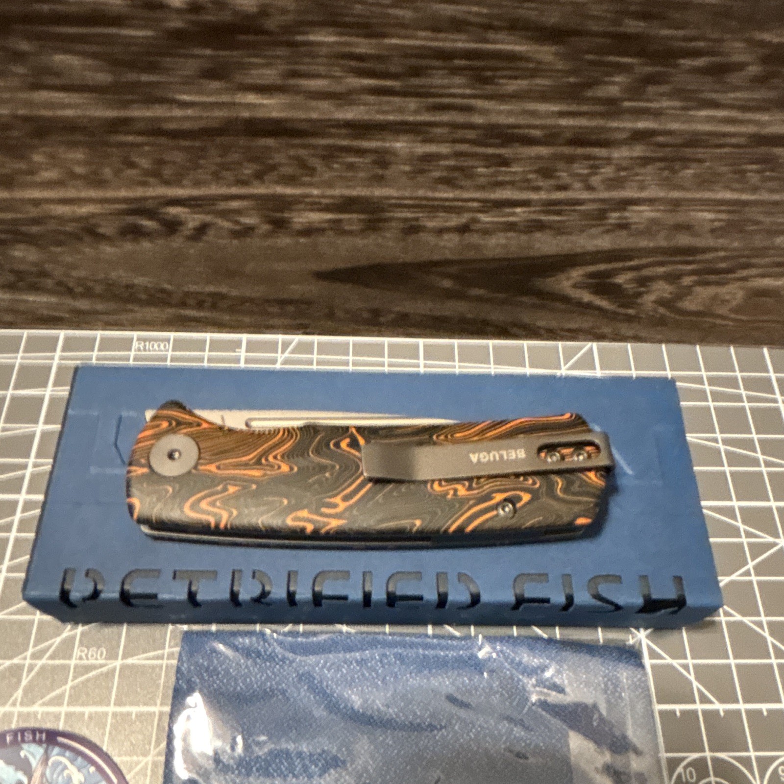 Petrified Fish Beluga Black/Orange G10 14C28N Drop Point