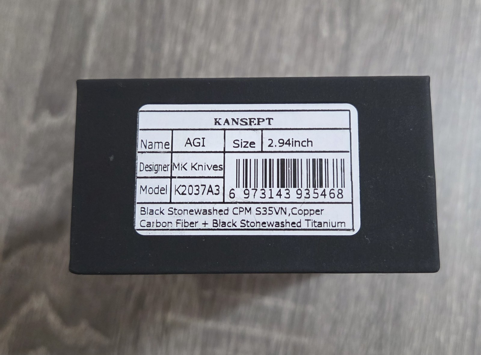 Kansept AGI K2037A3 – 2.94″ Blk Stonewash CPM S35VN – Copper CF – Titanium – EUC