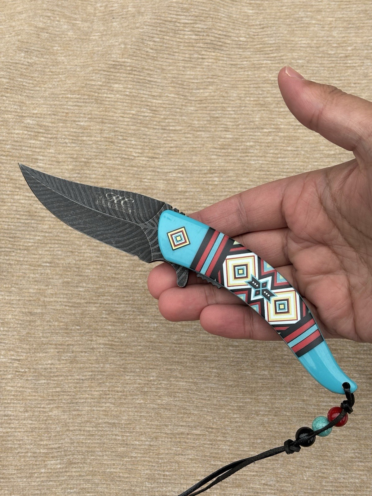 Western Style Pocket Knife Spring Assist Feather Navajo Blue Lanyard Beads