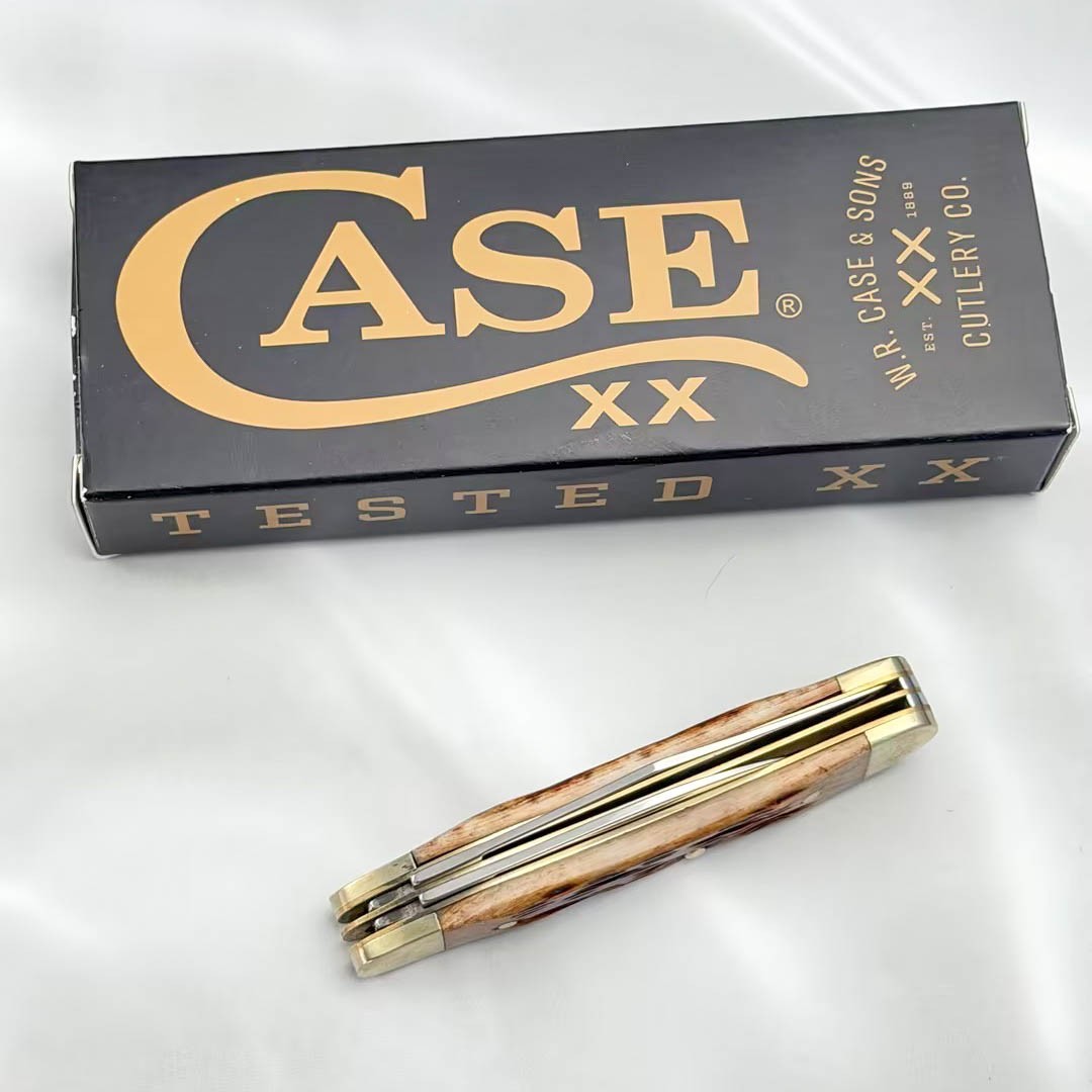 Case xx Knives 00045 Peach Seed Jig Amber Bone Peanut Stainless Pocket Knife