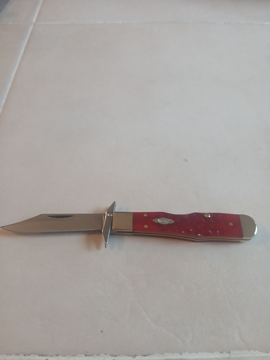 Case XX 2026 Dark Red Bone Peach Seed Jigged Cheetah Cub 611 1/2L CS ITEM #31943