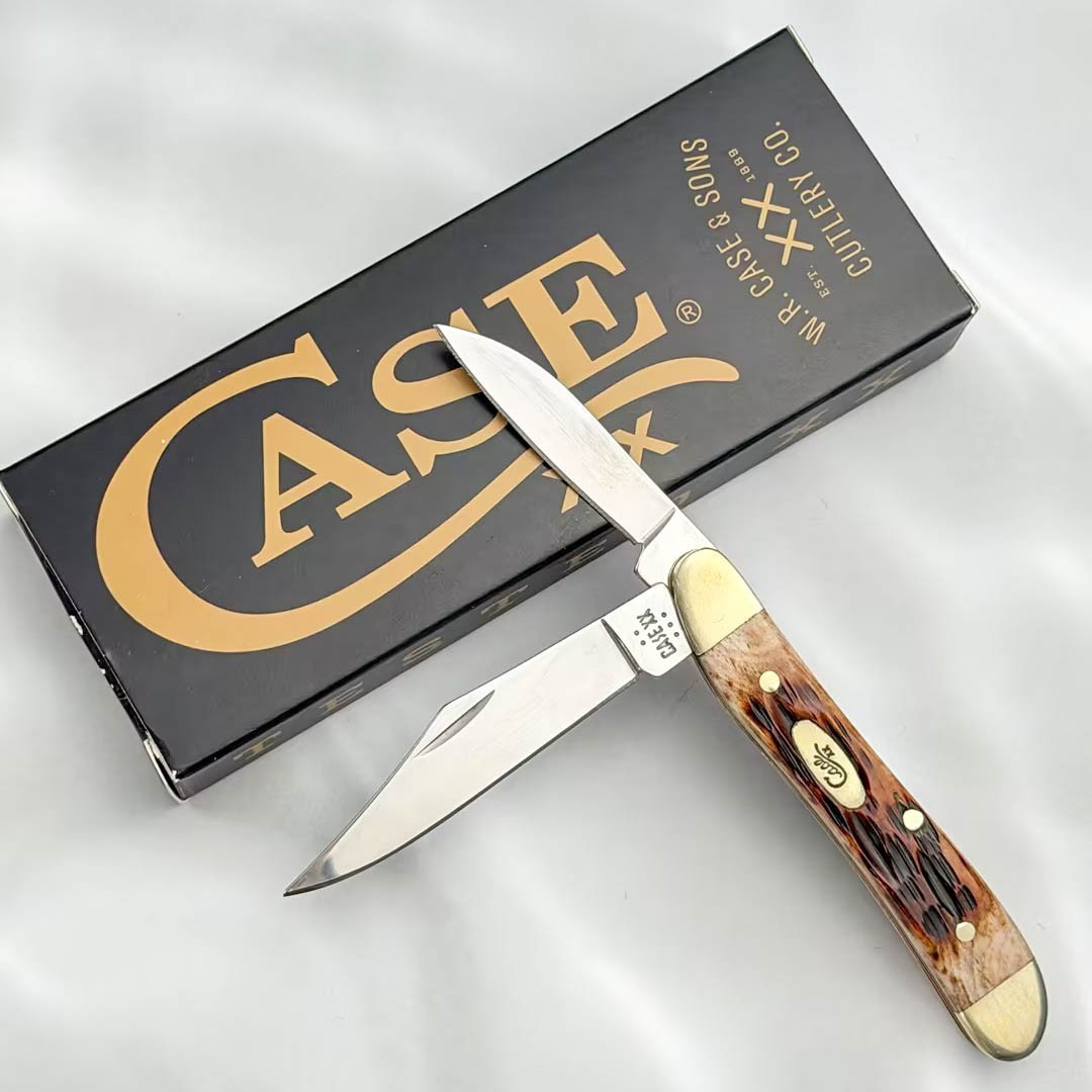 Case xx Knives 00045 Peach Seed Jig Amber Bone Peanut Stainless Pocket Knife